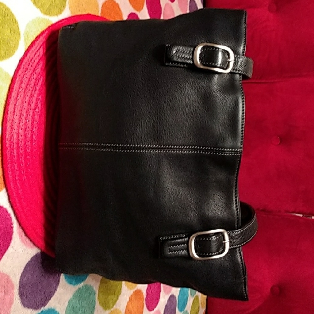 Authentic NWOT Tignanello large black leather bag.